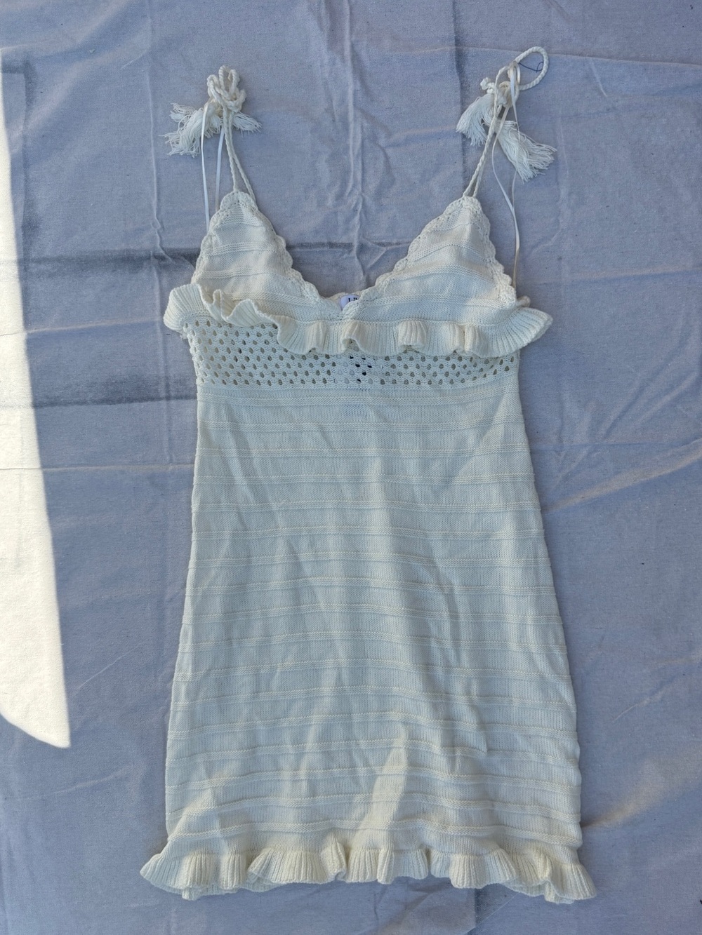 Lilyful Cream Knit Ruffle Mini Dress with Tassel Straps